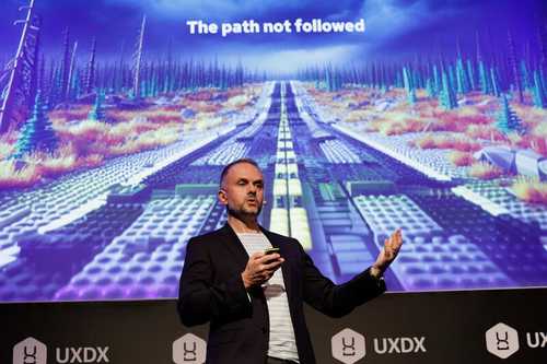 People talking at an exhibition stand
